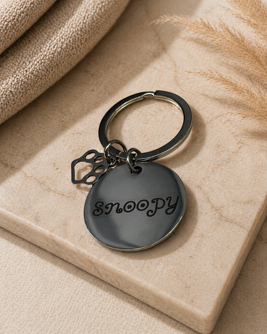 Porte-clés rond avec pendentif patte de chien